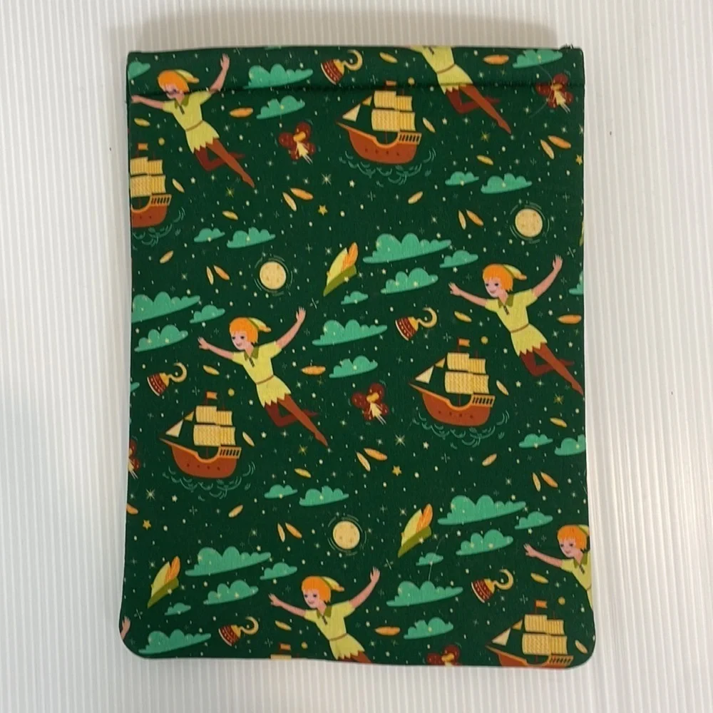 Padded tablet cover or book reader cover with Peter Pan print design